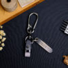 Premium Vinfast VF 9 Key Fob Cover featuring a free engraved tag and four hardware options when ordering.