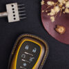 Close-up of Chevrolet EV Key Fob Cover featuring exquisite stitching details.