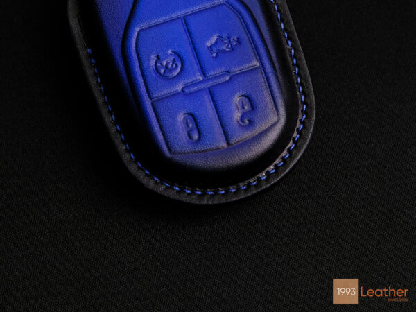 Close-up of Maserati MC20 Key Fob Cover highlighting exquisite stitching details.