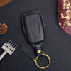 Acura TLX leather key fob cover in the back side with logo embossed and tool to apply accessories