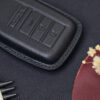 Zoom in Acura TLX leather key fob cover in version fully cover highlighting exquisite hand stitching and protect key well
