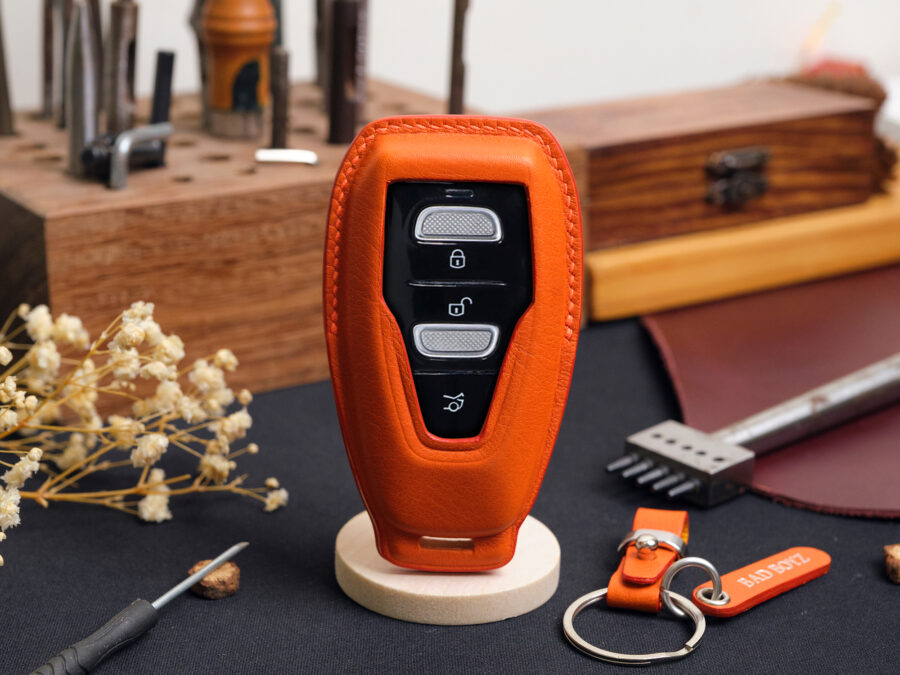 High-end leather key fob cover for Aston Martin DBX featuring precise stitching that enhances both durability and craftsmanship.