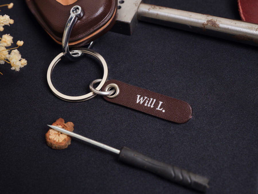 Engraved leather tag labeled WILL attached to metal keyring for Chevrolet Malibu key fob cover set
