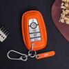 Orange leather Ford Expedition key fob cover with metal keyring and engraved leather tag