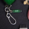 Leather tag engraved B-90 with metal keyring attached to Jeep Gladiator key fob cover set