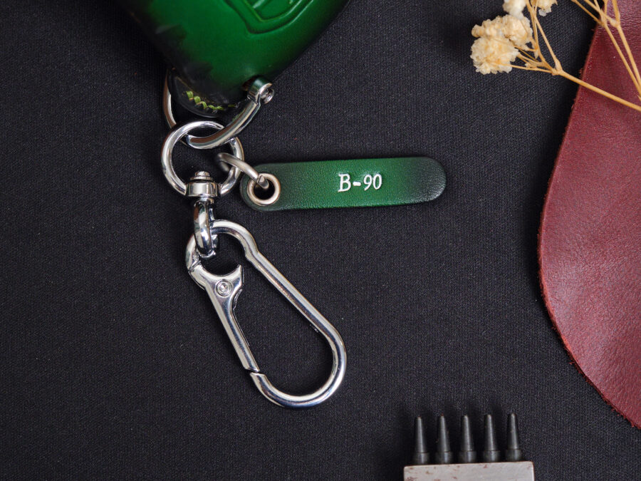 Leather tag engraved B-90 with metal keyring attached to Jeep Gladiator key fob cover set