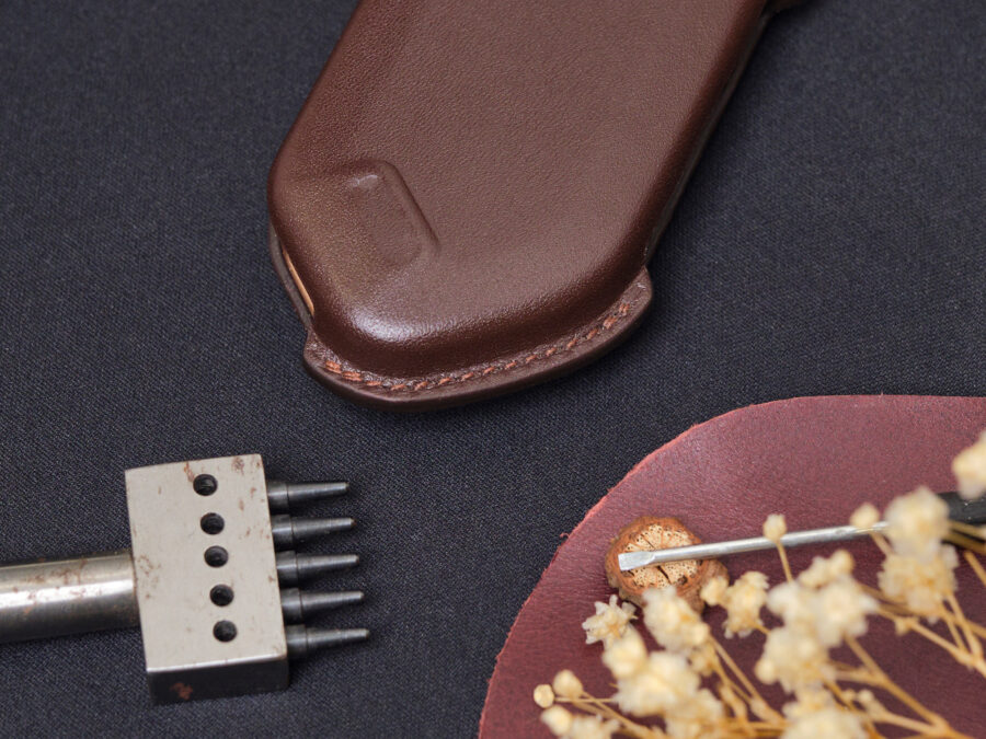 Kia Seltos key fob cover with even and high-quality stitching, applying a flawless design