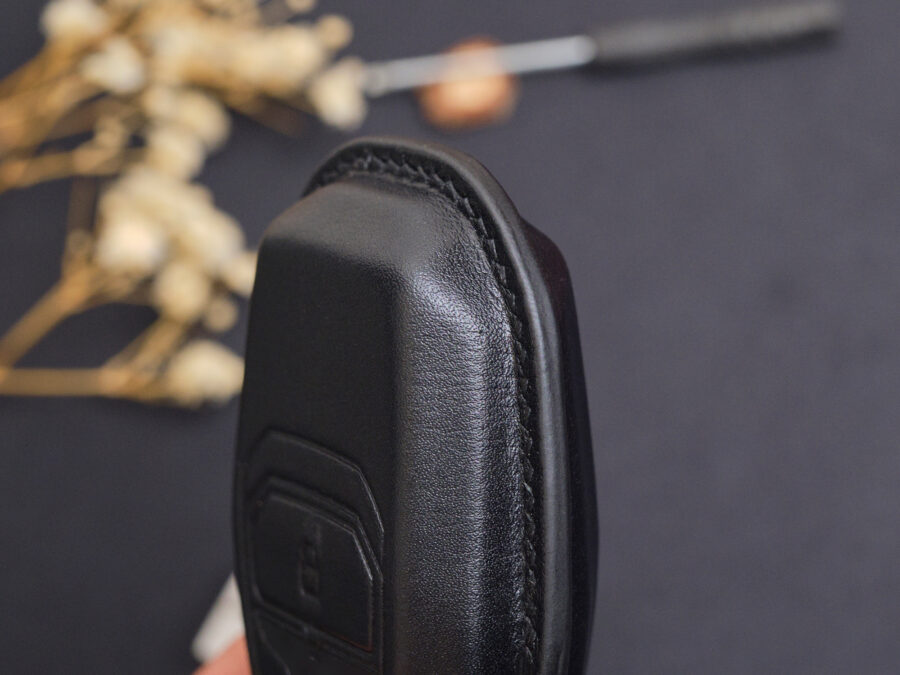 Luxury leather key fob cover for Aston Martin DB12 designed to deliver a smooth, ergonomic grip for superior comfort in daily use.