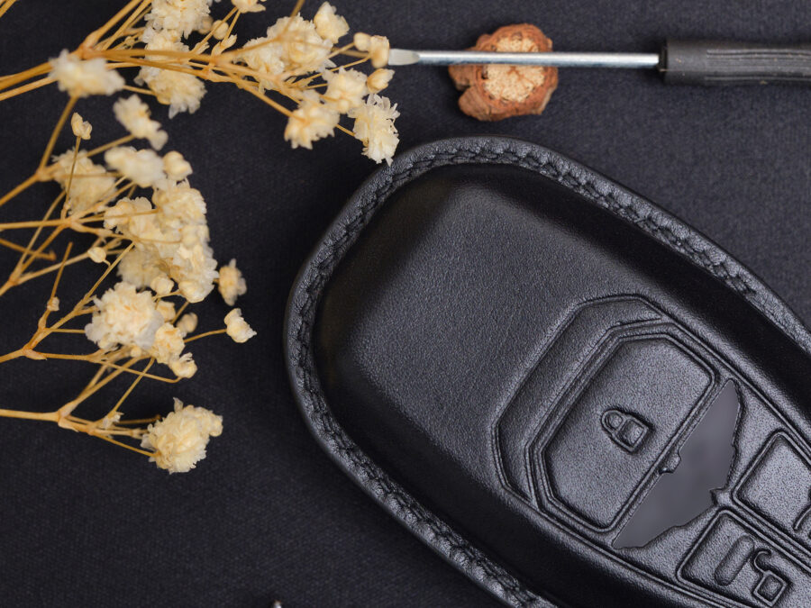 Top-tier leather key fob cover for Aston Martin DB12 with fine, precise stitching that enhances durability and luxurious appeal.