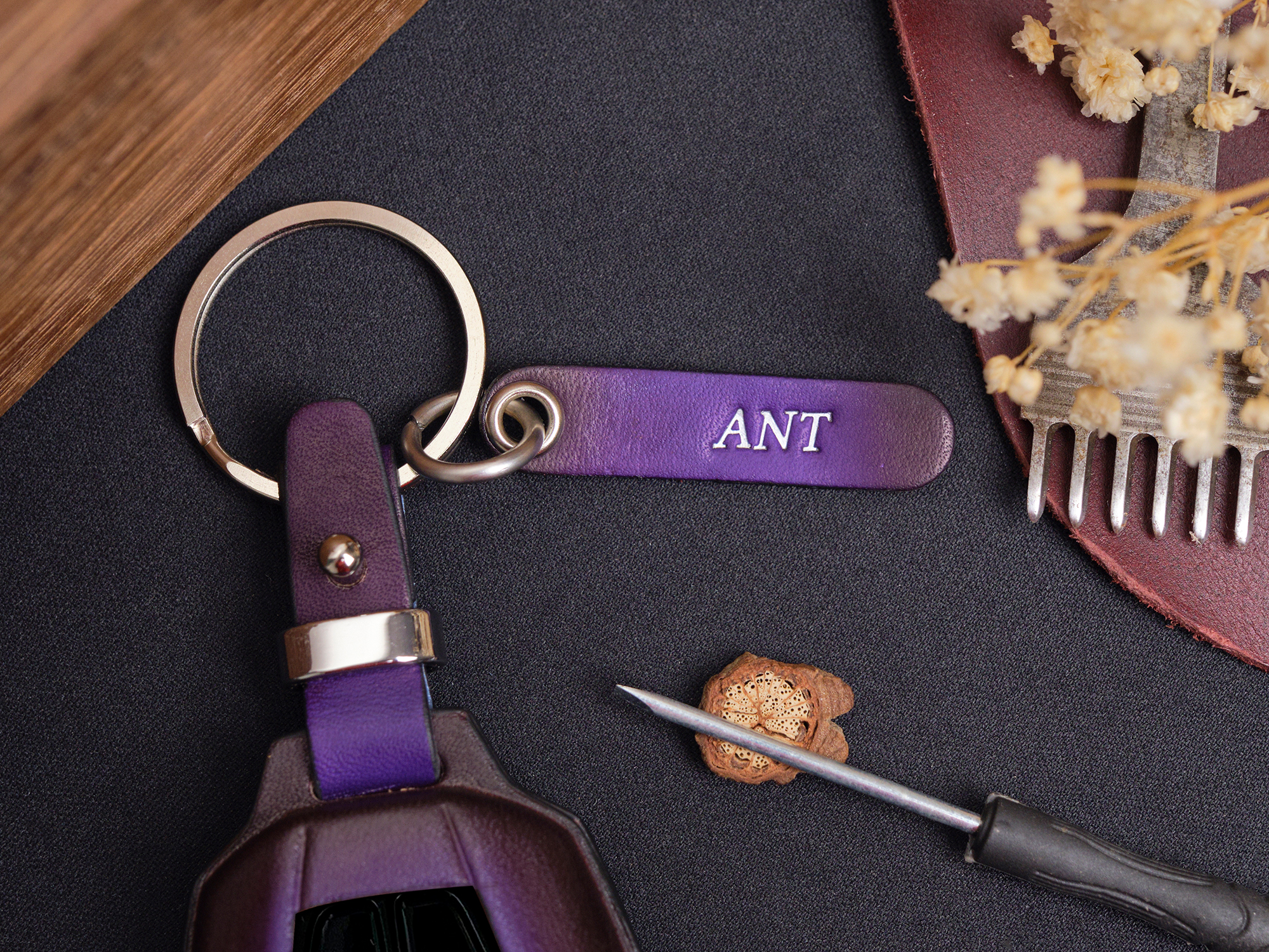 Superb leather key fob cover for Aston Martin VANTAGE featuring a complimentary engraved tag and four hardware options for personalized styling.