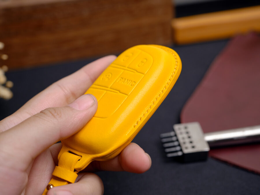 Luxury leather key fob cover for Jeep Compass designed for an ergonomic, smooth grip that feels secure and refined in hand.