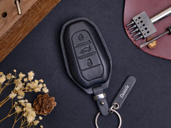 Peugeot e-208, e-2008, e-Traveller Key Fob Cover is handcrafted by skilled years-experience craftsmen with detailed-oriented meticulousness