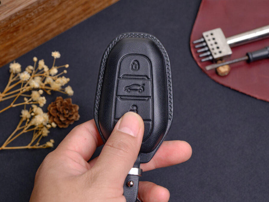 Peugeot e-208, e-2008, e-Traveller Key Fob Cover made of high-class leather brings about maximum protection and flawless approach