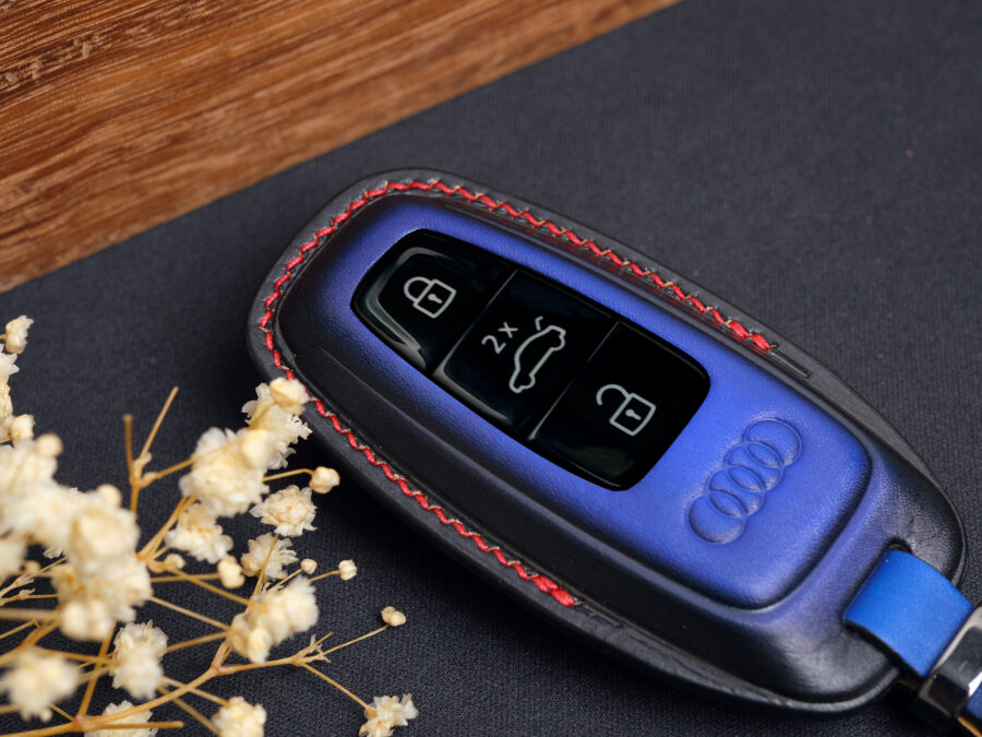 Leather Audi Q-Series key fob cover front view showing button layout and contrast stitching