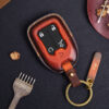 Leather GMC Terrain key fob cover front view with metal keyring and engraved leather tag
